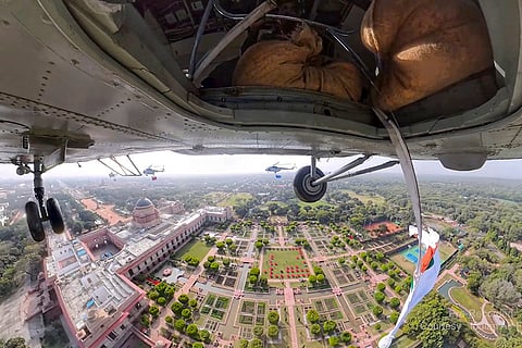 Mi-17 1V helicopters of the Indian Air Force’s (IAF) 129 helicopter unit perform a flypast in 'Dhwaj' formation during the 77th Republic Day Parade, in New Delhi. 