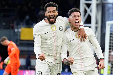 Chelsea's Enzo Fernandez, right, celebrates scoring during the English Premier League soccer match between Crystal Palace and Chelsea in London.