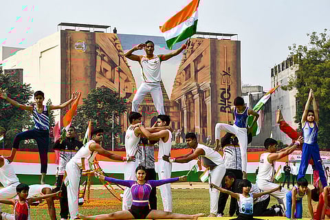 Artists perform during the 77th Republic Day celebrations, in Prayagraj.