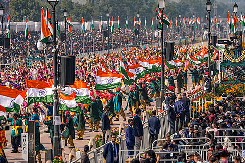 Artists perform during the 77th Republic Day Parade, at Kartavya Path, in New Delhi.