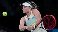 AP Photo/Asanka Brendon Ratnayake : Elena Rybakina of Kazakhstan plays a backhand return to Tereza Valentova of the Czech Republic during their third round match at the Australian Open tennis championship in Melbourne, Australia, Saturday, Jan. 24, 2026. 