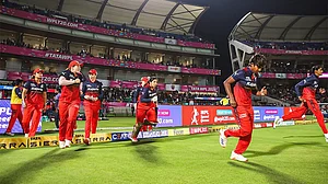 RCBTweets/X : RCB cricketers in action.