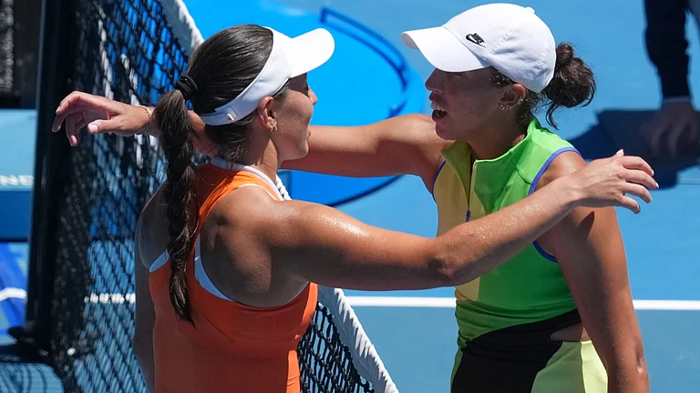 Jessica Pegula, left, of the U.S., is congratulated by her compatriot Madison Keys after winning their fourth round match at the Australian Open tennis championship - AP