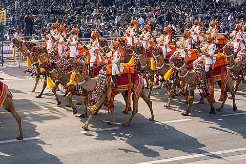 Border Security Force's (BSF) camel-mounted contingent marches during the 77th Republic Day Parade at Kartavya Path, in New Delhi.