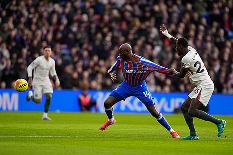 Crystal Palace's Jean-Philippe Mateta and Chelsea's Trevoh Chalobah, right, in action during the English Premier League soccer match between Crystal Palace and Chelsea in London.