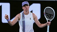 | Photo: AP/Aaron Favila : Iga Swiatek of Poland reacts during her third round match against Anna Kalinskaya of Russia at the Australian Open tennis championship in Melbourne, Australia.