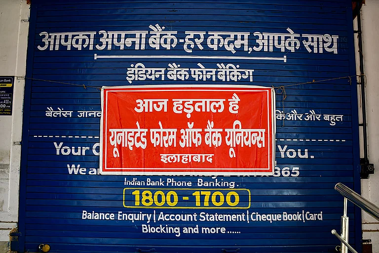 A view of a closed bank amid nationwide strike by United Forum of Bank Unions, demanding the implementation of a five-day workweek, in Prayagraj. - | Photo: PTI