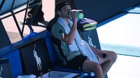 What Is Australian Open Extreme Heat Protocol? All You Need To Know | Photo: AP/Mark Baker : Taylor Fritz of the U.S. takes a drink as he plays against Lorenzo Musetti of Italy during their fourth round match at the Australian Open tennis championship in Melbourne, Australia, Monday, Jan. 26, 2026.