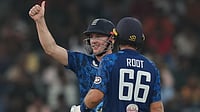 (AP Photo/Eranga Jayawardena) : England's captain Harry Brook celebrates his century as Joe Root watches during the third ODI cricket match between England and Sri Lanka in Colombo, Sri Lanka, Tuesday, Jan. 27, 2026