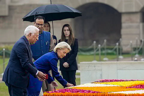 European Council President Antonio Costa, left, and European Commission President Ursula von der Leyen pay homage to Mahatma Gandhi at Rajghat, in New Delhi.