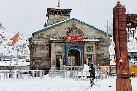 The 'Kedarnath Dham' remains covered in snow after snowfall in the region, in Rudraprayag.