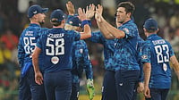 (AP Photo/Eranga Jayawardena) : England's Jamie Overton celebrates with teammates the wicket of Sri Lanka's Sri Lanka's Pathum Nissanka during the third ODI cricket match between England and Sri Lanka in Colombo, Sri Lanka, Tuesday, Jan. 27, 2026
