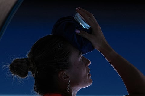 Aryna Sabalenka of Belarus places an ice pack to her face during her quarterfinal match against Iva Jovic of the U.S. at the Australian Open tennis championship in Melbourne, Australia.