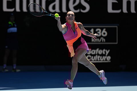Aryna Sabalenka of Belarus plays a forehand return to Iva Jovic of the U.S during their quarterfinal match at the Australian Open tennis championship in Melbourne, Australia.