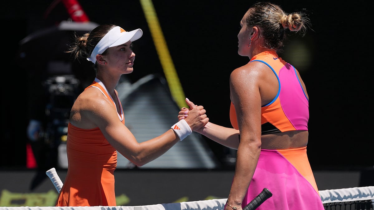 Iva Jovic, left, of the U.S. congratulates Aryna Sabalenka of Belarus following their quarterfinal match at the Australian Open tennis championship. - AP