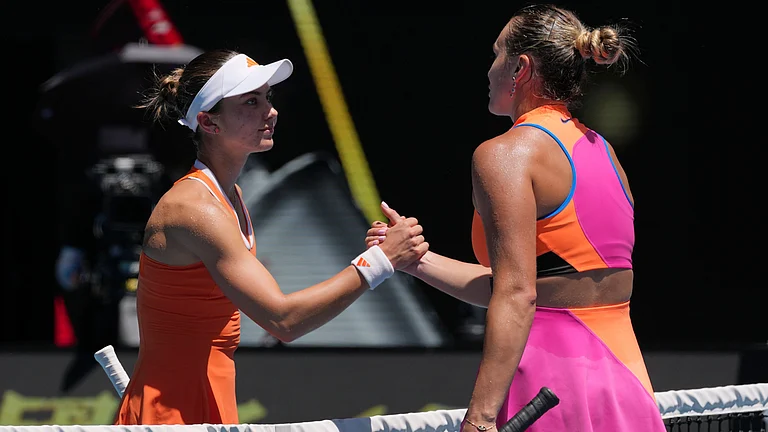 Iva Jovic, left, of the U.S. congratulates Aryna Sabalenka of Belarus following their quarterfinal match at the Australian Open tennis championship. - AP