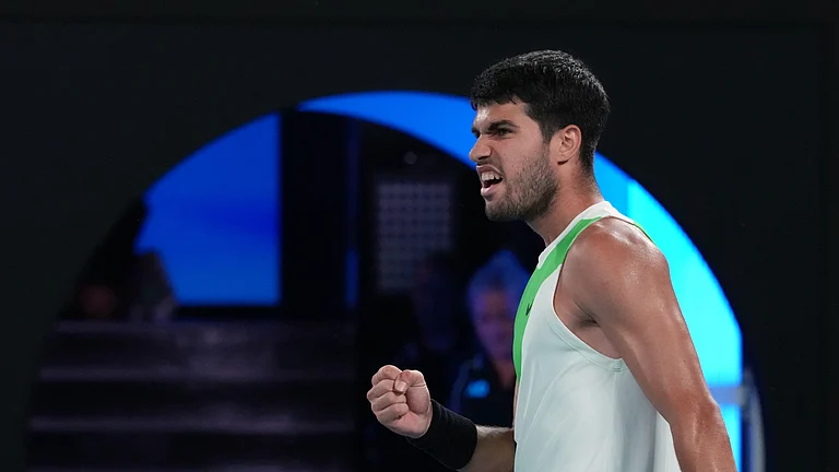 Carlos Alcaraz of Spain reacts during his quarterfinal match against Alex de Minaur of Australia at the Australian Open tennis championship in Melbourne, Australia, Tuesday, Jan. 27, 2026. - | Photo: AP/Asanka Brendon Ratnayake