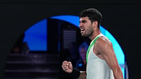 | Photo: AP/Asanka Brendon Ratnayake : Carlos Alcaraz of Spain reacts during his quarterfinal match against Alex de Minaur of Australia at the Australian Open tennis championship in Melbourne, Australia, Tuesday, Jan. 27, 2026. 