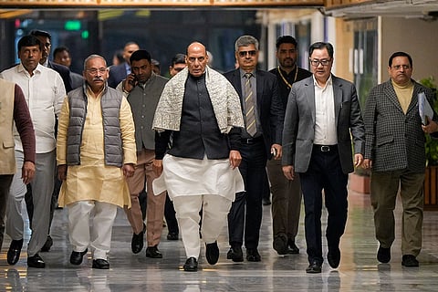 Defence Minister Rajnath Singh, centre, with Union Parliamentary Affairs Minister Kiren Rijiju, right, and others, arrives for the all-party meeting ahead of the Budget session of Parliament, in New Delhi.