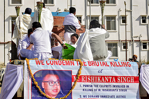 Family members perform the last rites of M. Rishikanta, who was allegedly shot dead by suspected Kuki militants, in Imphal.