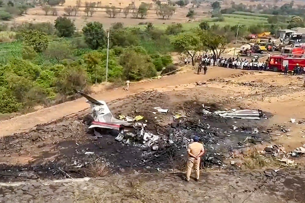 Remains of Maharashtra Deputy Chief Minister Ajit Pawar's plane that crashed during landing, near Baramati in Pune district, Maharashtra. - PTI
