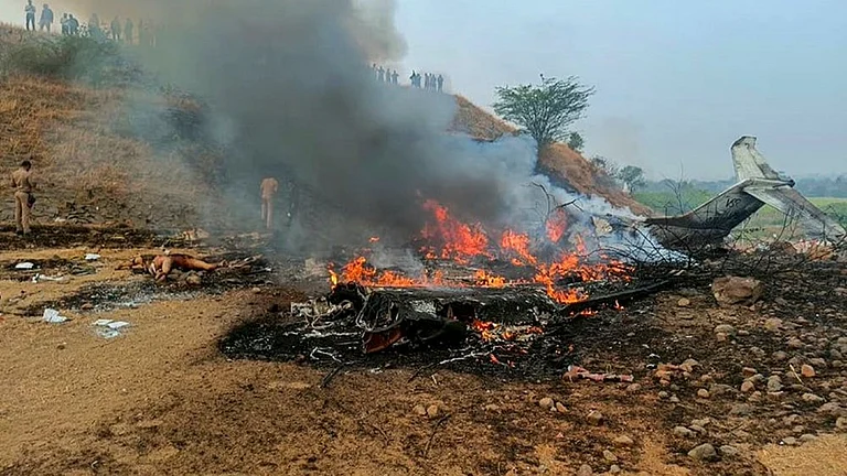 Maharashtra Deputy Chief Minister Ajit Pawar's plane in flames after it crashed during landing, at Baramati in Pune district, Maharashtra. Pawar, along with three others on board, was killed in the crash. - | Photo: PTI