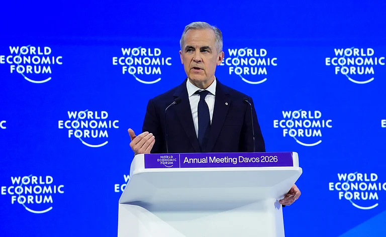 Canada Prime Minister Mark Carney delivers a speech at the World Economic Forum in Davos, Switzerland on Tuesday, Jan. 20, 2026. - Sean Kilpatrick/The Canadian Press via AP