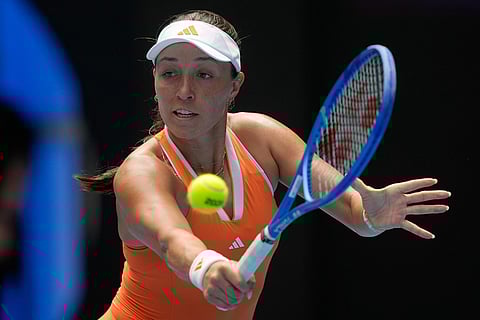 Jessica Pegula of the U.S. plays a backhand return to compatriot Amanda Anisimova during their quarterfinal match at the Australian Open tennis championship in Melbourne, Australia.