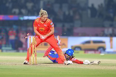 Gujarat Giants' Sophie Devine attempt to run out Delhi Capitals' Sneh Rana during the Women's Premier League (WPL) 2026 T20 cricket match between Gujarat Giants and Delhi Capitals, at BCA Stadium, in Vadodara, Gujarat.