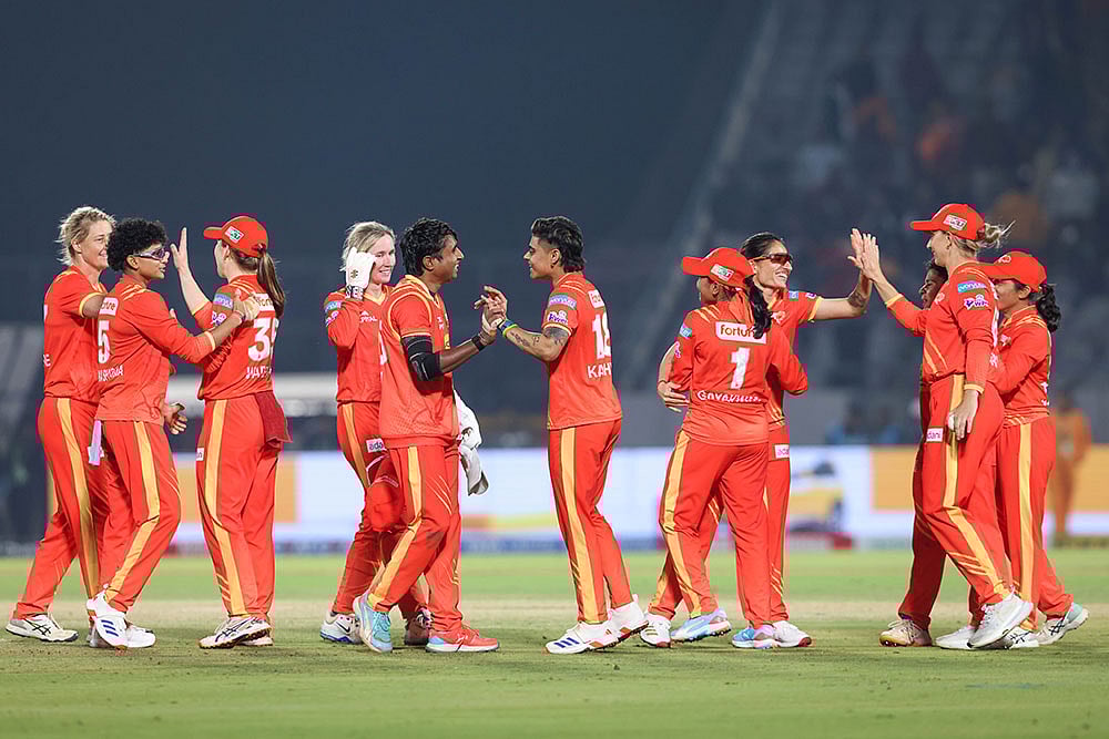 Gujarat Giants' players celebrate after winning the match against Delhi Capitals during the Women’s Premier League (WPL) 2026 T20 cricket match at the BCA Stadium, in Vadodara, Gujarat. - | Photo: BCCI via PTI 
