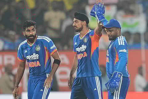 India's Arshdeep Singh, center, celebrates with teammates after the dismissal of New Zealand's Tim Seifert during the fourth T20 cricket match between India and New Zealand in Visakhapatnam.