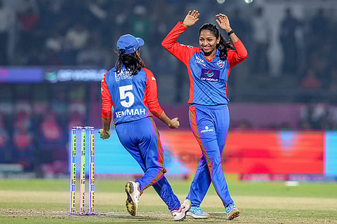 Delhi Capitals' captain Jemimah Rodrigues celebrates the wicket of Gujarat Giants' captain Ashleigh Gardner with teammate Minnu Mani during the Women's Premier League (WPL) 2026 T20 cricket match between Gujarat Giants and Delhi Capitals, at BCA Stadium, in Vadodara, Gujarat.
