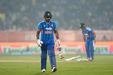 India's Sanju Samson walks off the field after losing his wicket during the fourth T20 cricket match between India and New Zealand in Visakhapatnam.