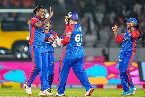 Delhi Capitals' Chinelle Henry celebrates the wicket of Gujarat Giants' Bharti Fulmali during the Women's Premier League (WPL) 2026 T20 cricket match between Gujarat Giants and Delhi Capitals, at BCA Stadium, in Vadodara, Gujarat.