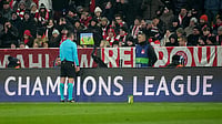 UEFA Champions League: Five Talking Points Before Matchday 8 – English Dominance, Spanish Struggles, And More | Photo: AP/Matthias Schrader : Referee Rade Obrenovic checks the VAR screen during the Champions League opening phase match between Bayern Munich and Union Saint-Gilloise, in Munich, Germany, Wednesday, Jan. 21, 2026.