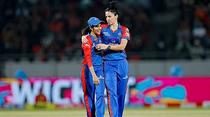 | Photo: BCCI via PTI : Delhi Capitals' Marizanne Kapp celebrates with captain Jemimah Rodrigues after taking the wicket of Royal Challengers Bengaluru's Georgia Voll during the Women's Premier League (WPL) 2026 T20 cricket match between Royal Challengers Bengaluru and Delhi Capitals, at BCA Stadium, in Vadodara, Gujarat.