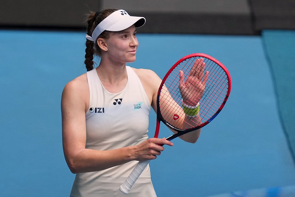 Elena Rybakina of Kazakhstan reacts after defeating Iga Swiatek of Poland in their quarterfinal match at the Australian Open tennis championship in Melbourne, Australia. - | Photo: AP/Asanka Brendon Ratnayake