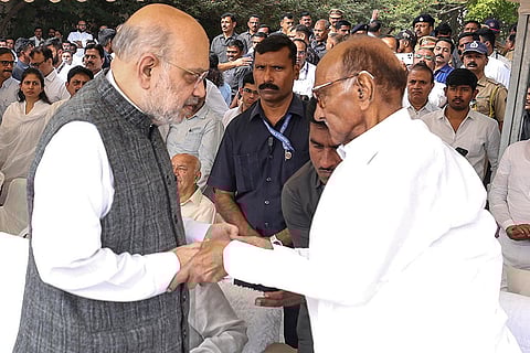 Union Home Minister Amit Shah meets NCP (SP) chief Sharad Pawar during the funeral of Maharashtra Deputy Chief Minister Ajit Pawar at the Vidya Pratishthan ground, in Baramati, Pune district. 