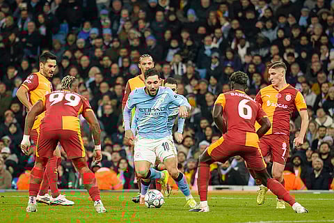 Manchester City's Rayan Cherki controls the ball during the Champions League opening phase soccer match Manchester City and Galatasaray in Manchester, England.