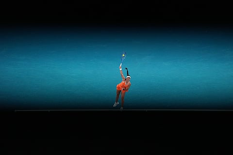 Jessica Pegula of the U.S. serves to Elena Rybakina of Kazakhstan during their semifinal match at the Australian Open tennis championship in Melbourne, Australia.