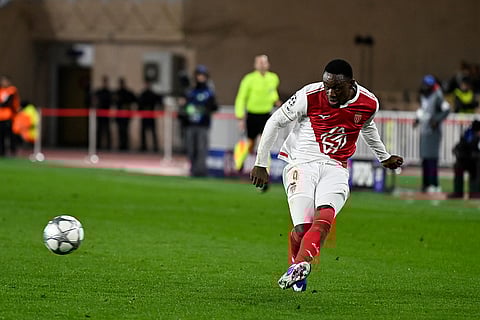 Monaco's Folarin Balogun passes the ball during the Champions League opening phase soccer match between Monaco and Juventus in Monaco.
