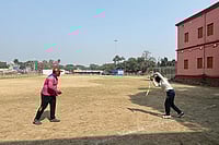 | Photo: Agnideb Bandyopadhyay : Perfecting the Grip: Manushri, 13, with her father and coach Koustav Rajak