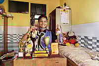 From Kolhapur To The Cricket Pitch: Pratiksha Pawar's Story | Photo: Dinesh Parab : Onward March: Pratiskha Pawar at home with her trophies