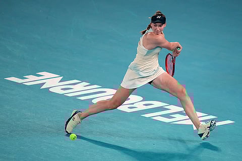 Elena Rybakina of Kazakhstan plays a backhand return to Jessica Pegula of the U.S. during their semifinal match at the Australian Open tennis championship in Melbourne, Australia.