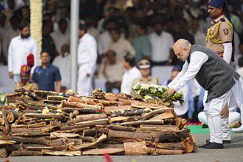 Union Home Minister Amit Shah pays last respects to the mortal remains of Maharashtra Deputy Chief Minister Ajit Pawar during his funeral at the Vidya Pratishthan ground at Baramati, in Pune district.
