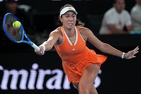 Jessica Pegula of the U.S. plays a forehand return to Elena Rybakina of Kazakhstan during their semifinal match at the Australian Open tennis championship in Melbourne, Australia.