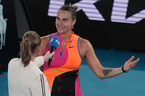 Aryna Sabalenka of Belarus reacts as she is interviewed after defeating Elina Svitolina of Ukraine in their semifinal match at the Australian Open tennis championship in Melbourne, Australia.