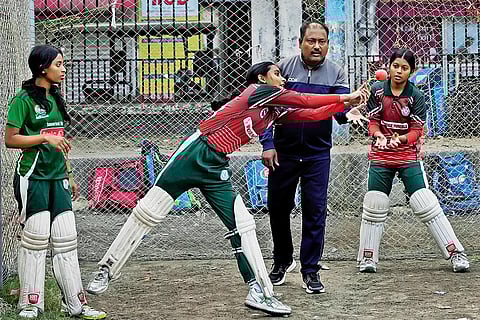 Gopal Saha, the childhood coach of Richa Ghosh, during a practice session at the Baghajatin Athletic Club