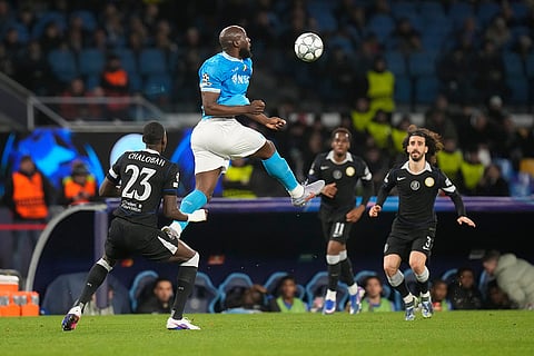 Napoli's Romelu Lukaku controls the ball during a Champions League opening phase soccer match between Napoli and Chelsea, in Naples, Italy.
