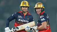 BCCI via PTI Photo : Royal Challengers Bengaluru's captain Smriti Mandhana and Grace Harris in action during their Women's Premier League 2026 match against UP Warriorz, at BCA Stadium in Vadodara.